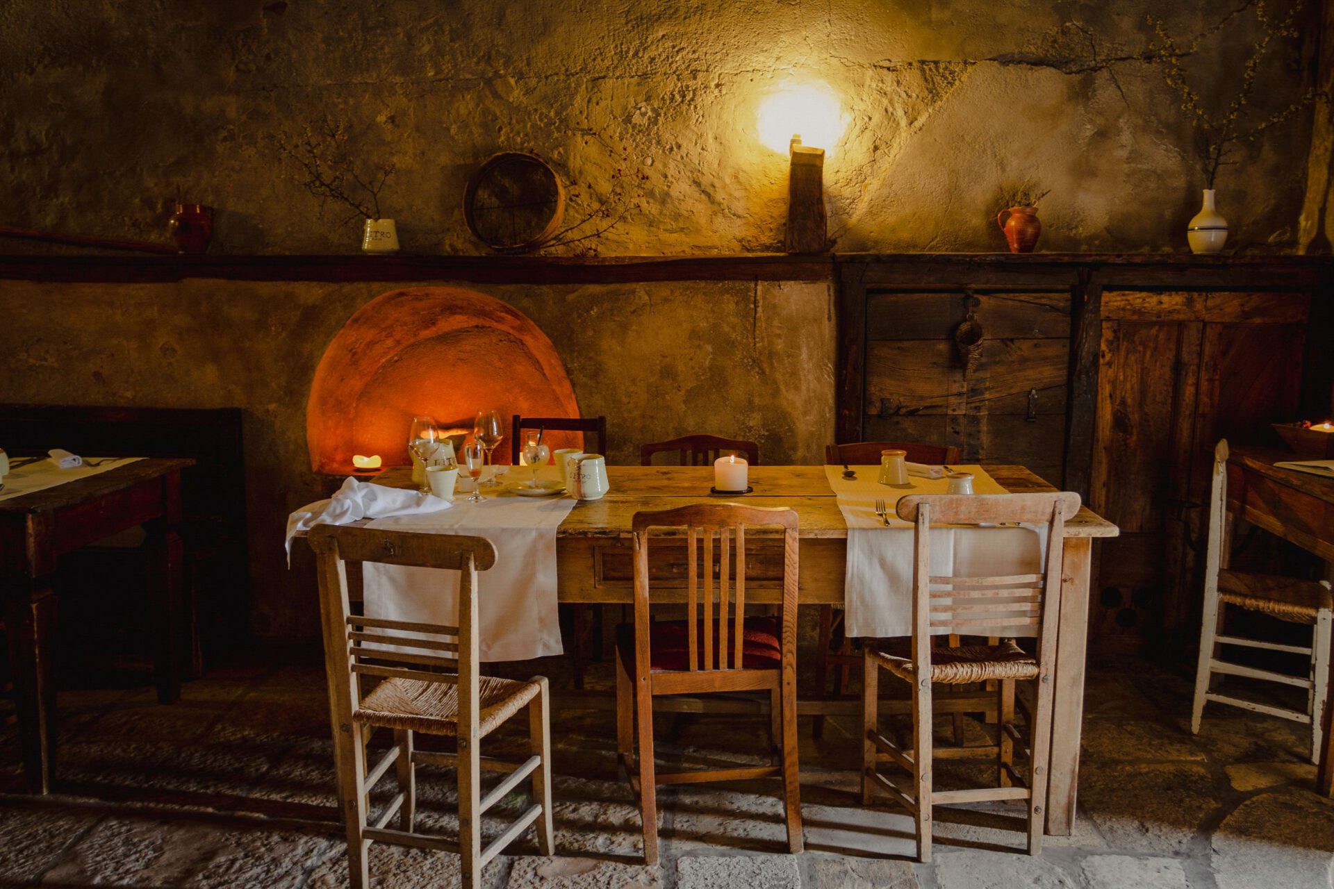 Rustic wooden table and chairs in typical local restaurant in abruzzo Italy