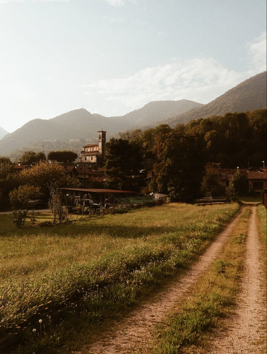 Antique houses submerged in a mountains and plants landscape in the countryside of Valcuvia in Varese Lombardy in Italy