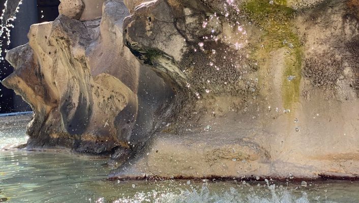 Rock sculptures in Roman fountain in Rome Lazio in Italy