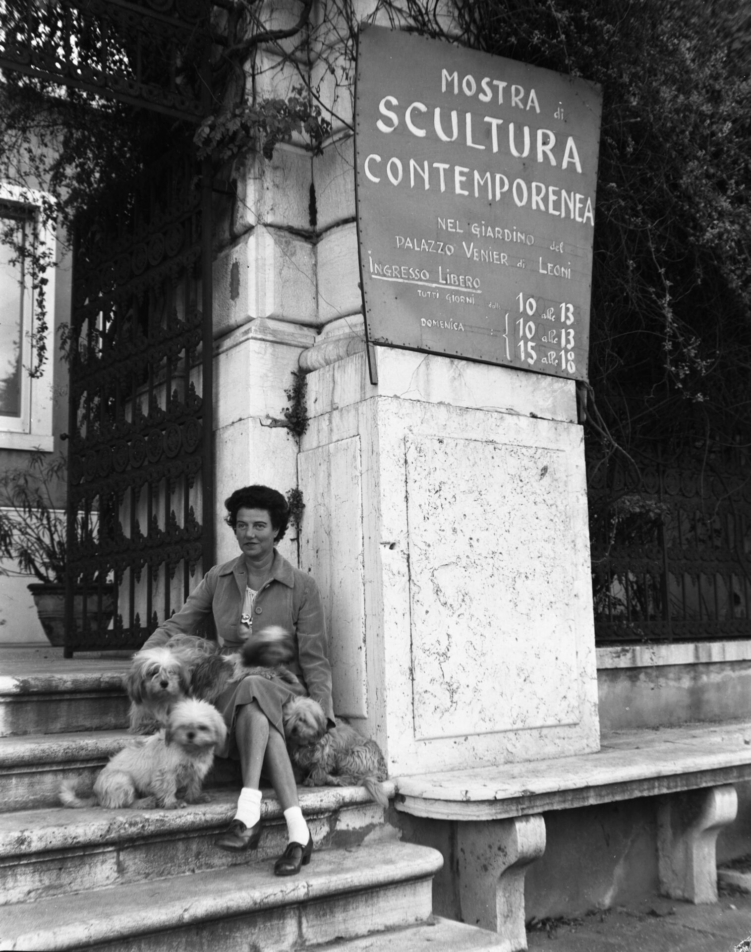 Peggy Guggenheim over a staircase in a terrace next to the Canal Grande, in front of the Palazzo Venier dei Leoni, in Venezia Veneto in Italy