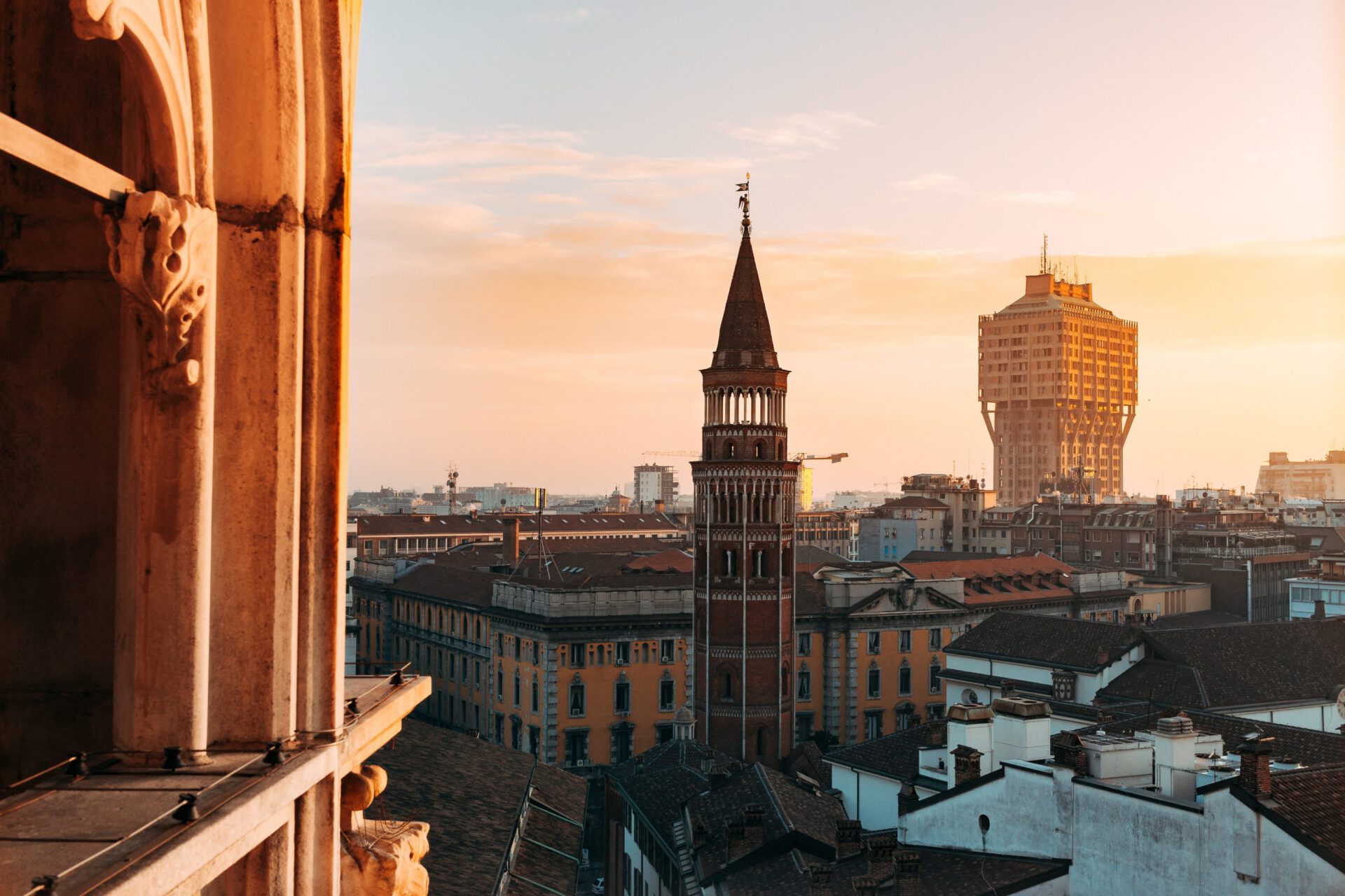 Top view of the Duomo's Cathedral and surrounding buildings from a top high tower in Milan Lombardy in Italy