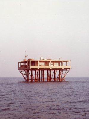 Rustic platform in the middle fo the sea for the Incredible Story of Rose Island of Italian director Sydney Sibilia's