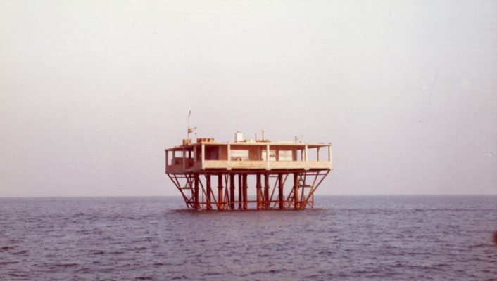 Rustic platform in the middle fo the sea for the Incredible Story of Rose Island of Italian director Sydney Sibilia's