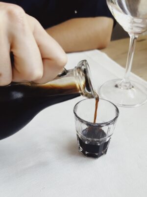an image of someone pouring a digestivo