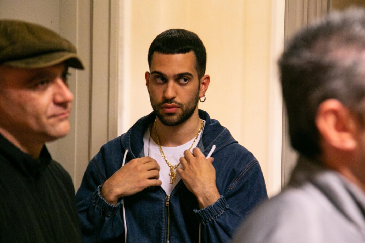 a man with white t-shirt and a sweet navy blue