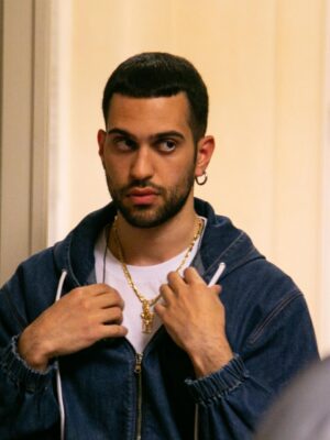 a man with white t-shirt and a sweet navy blue