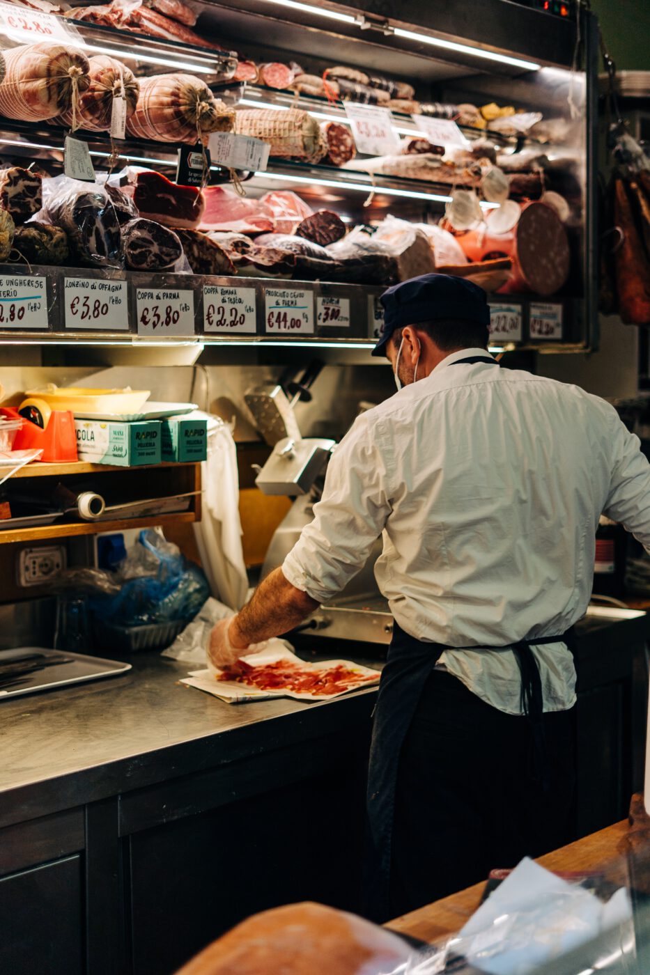 Traveling Italy on a Dime - italian architecture Italy small villages butcher macellaio italiano prosciutto crudo spring in italy