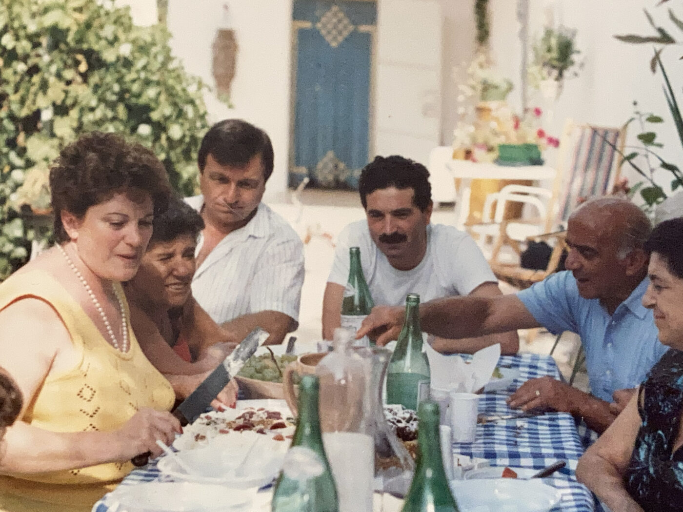 ‘’Il Paese in Festa’’: The Story of Puglian Feasts & A Traditional Focaccia Recipe traditional party festival italian town luminarie puglia puglian party table eating