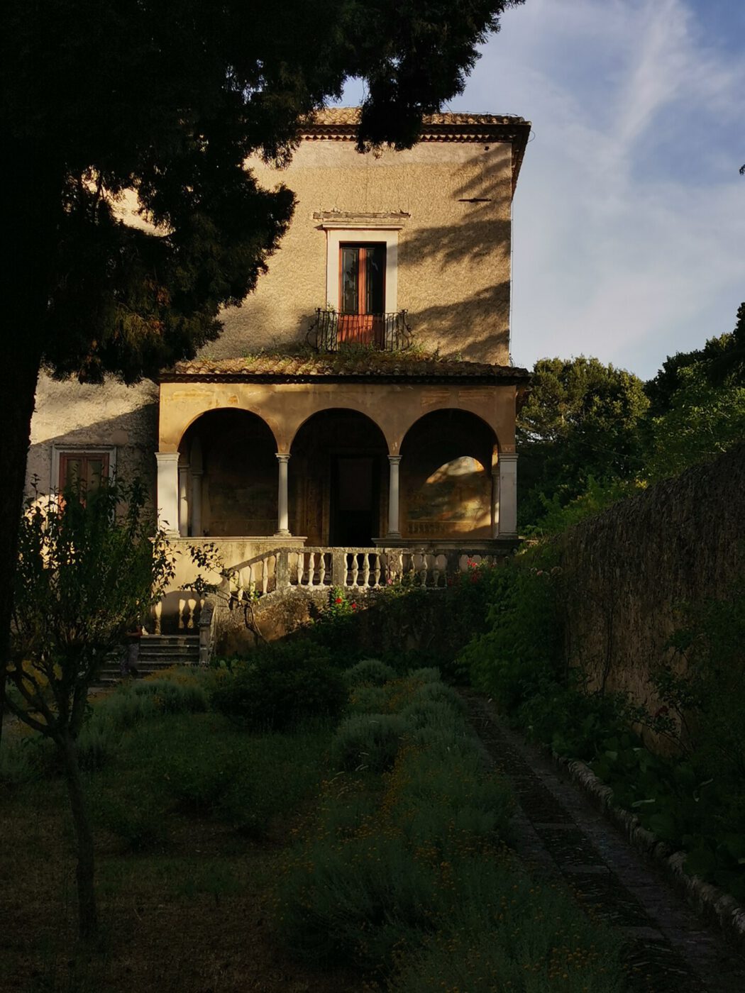 A Day in Certosa: A Peaceful Walk through Certosini’s Mysteries certosa di padula campania view italian architecture photography aesthetics italian landscape view loggia shadows
