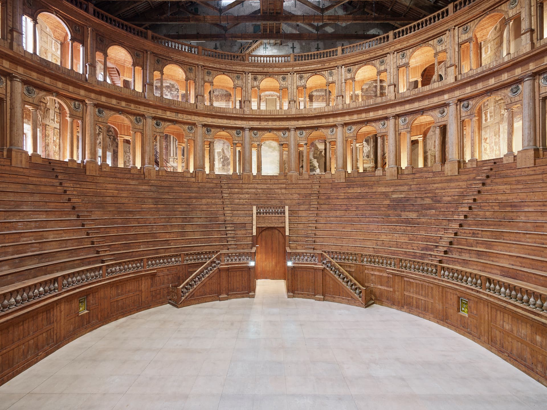 Front view of the Teatro Farnese with a medieval style in wood arches and staircases at the Palazzo della Pilotta at Parma in Emilia Romagna in Italy