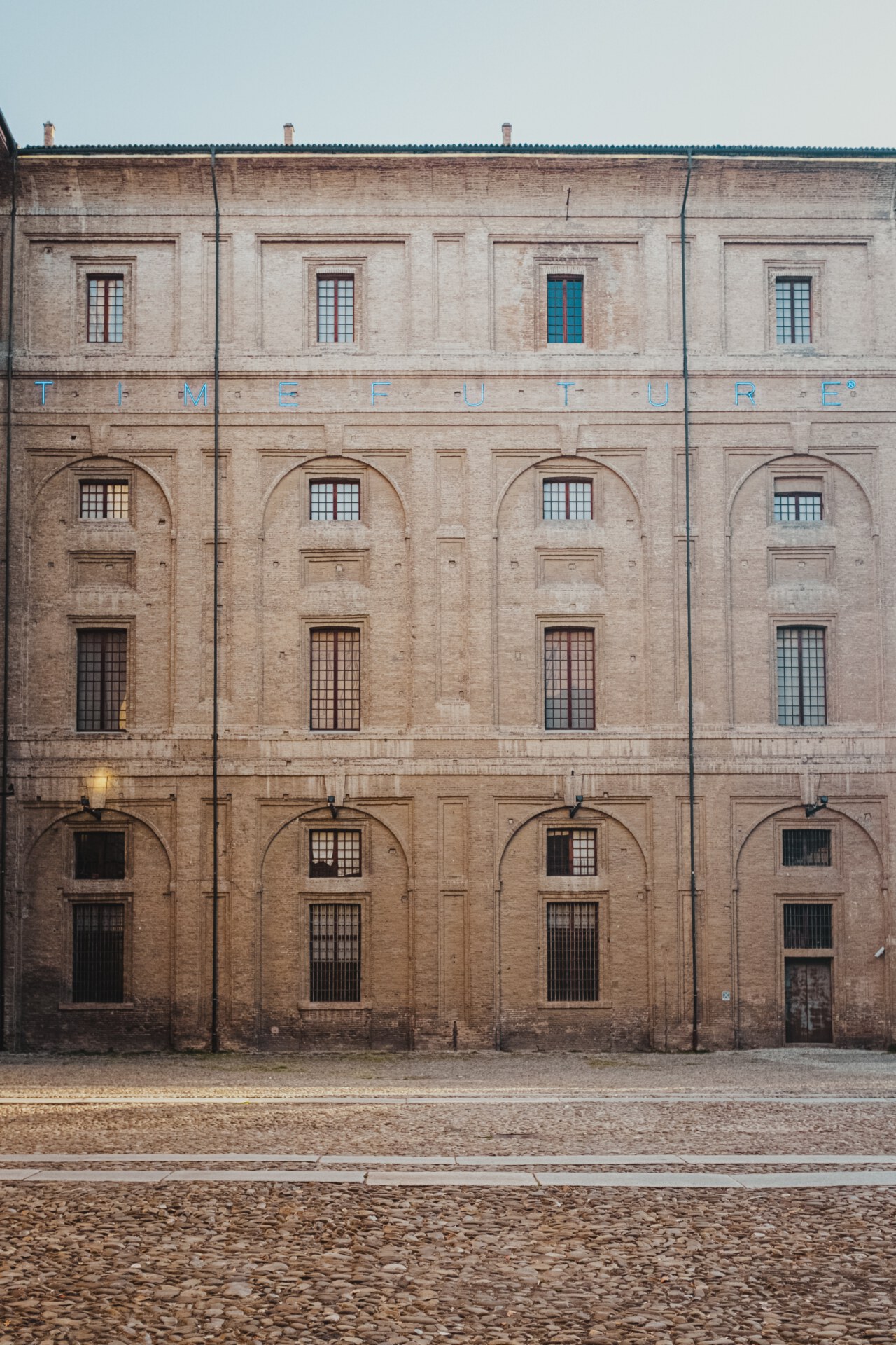 Front view of the Palazzo della Pilotta of bricks and arches fecade at Parma in Emilia Romagna in Italy