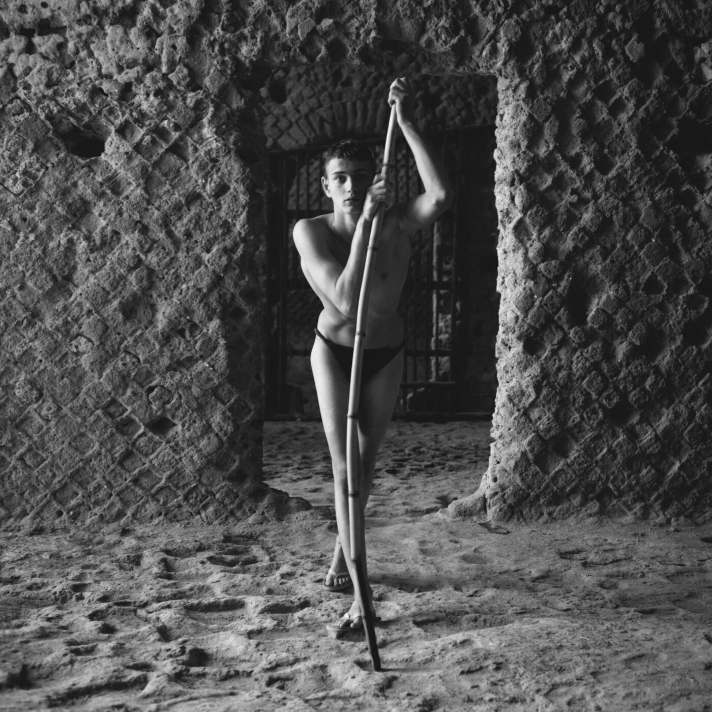 Young man in Black & White at Napoli Campania in Italy, photographed by Brett Lloyd