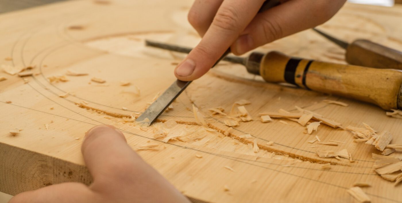 artisan shaving wood Italy