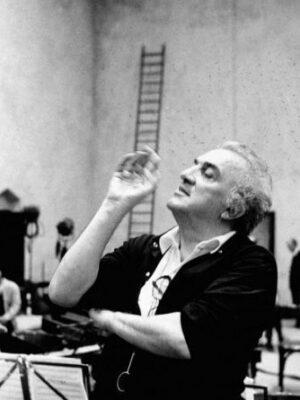 Italian film director Fellini smoking a cigarette