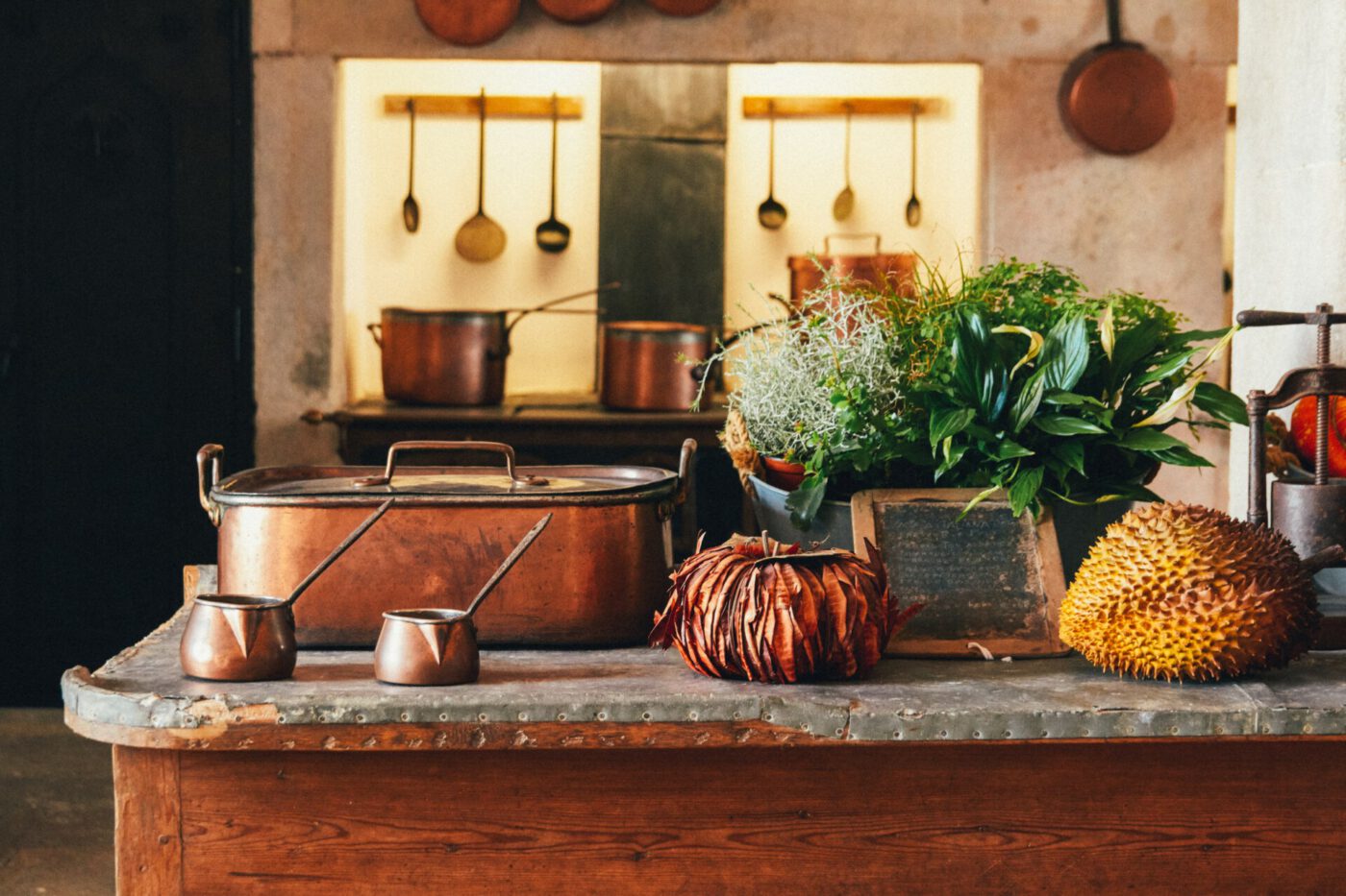 Italian copper pots on counter in kitchen