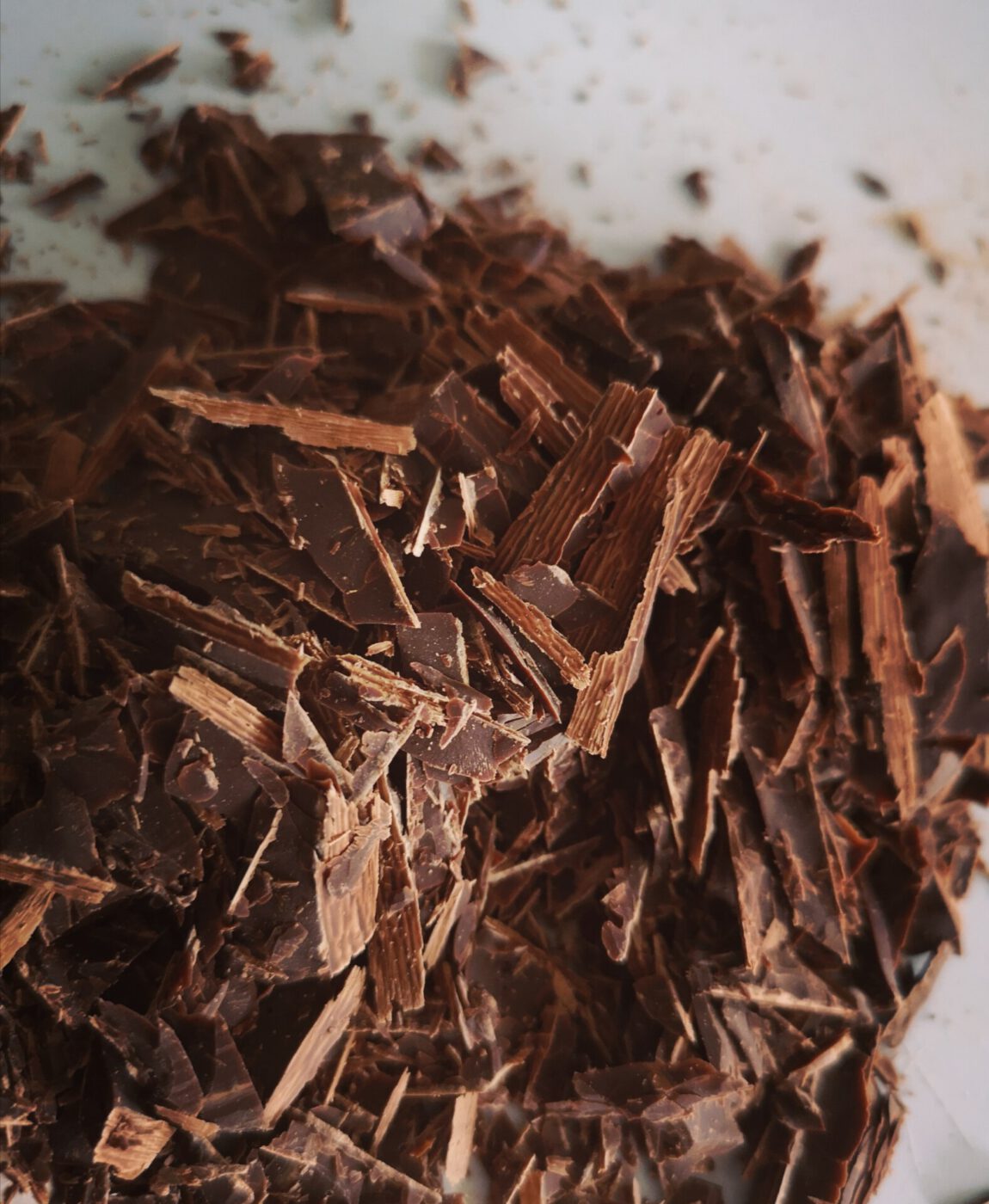 Close up to shredder chocolate and white background in Italy