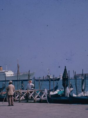 an image of boats along the coast of venice