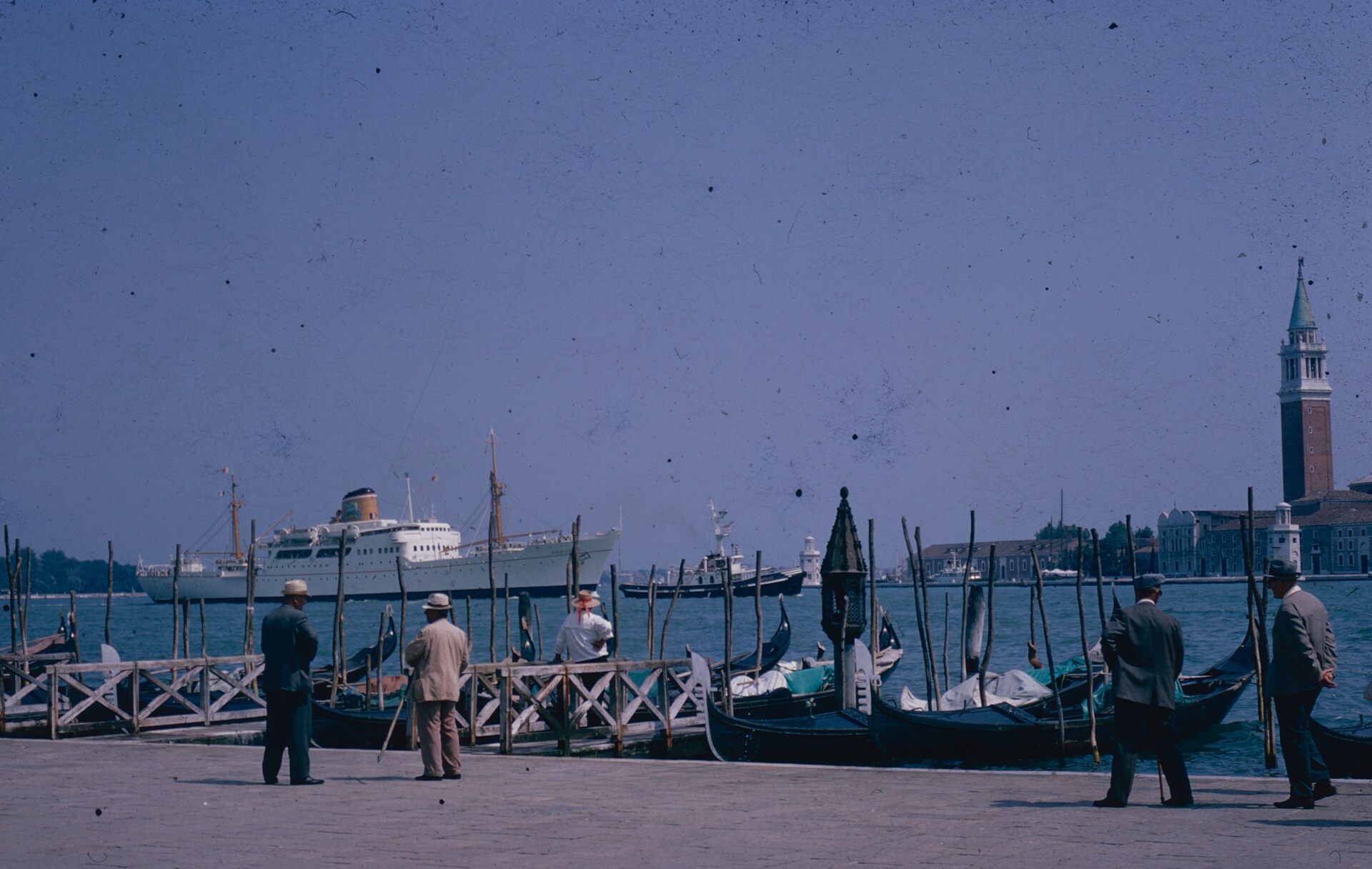 an image of boats along the coast of venice