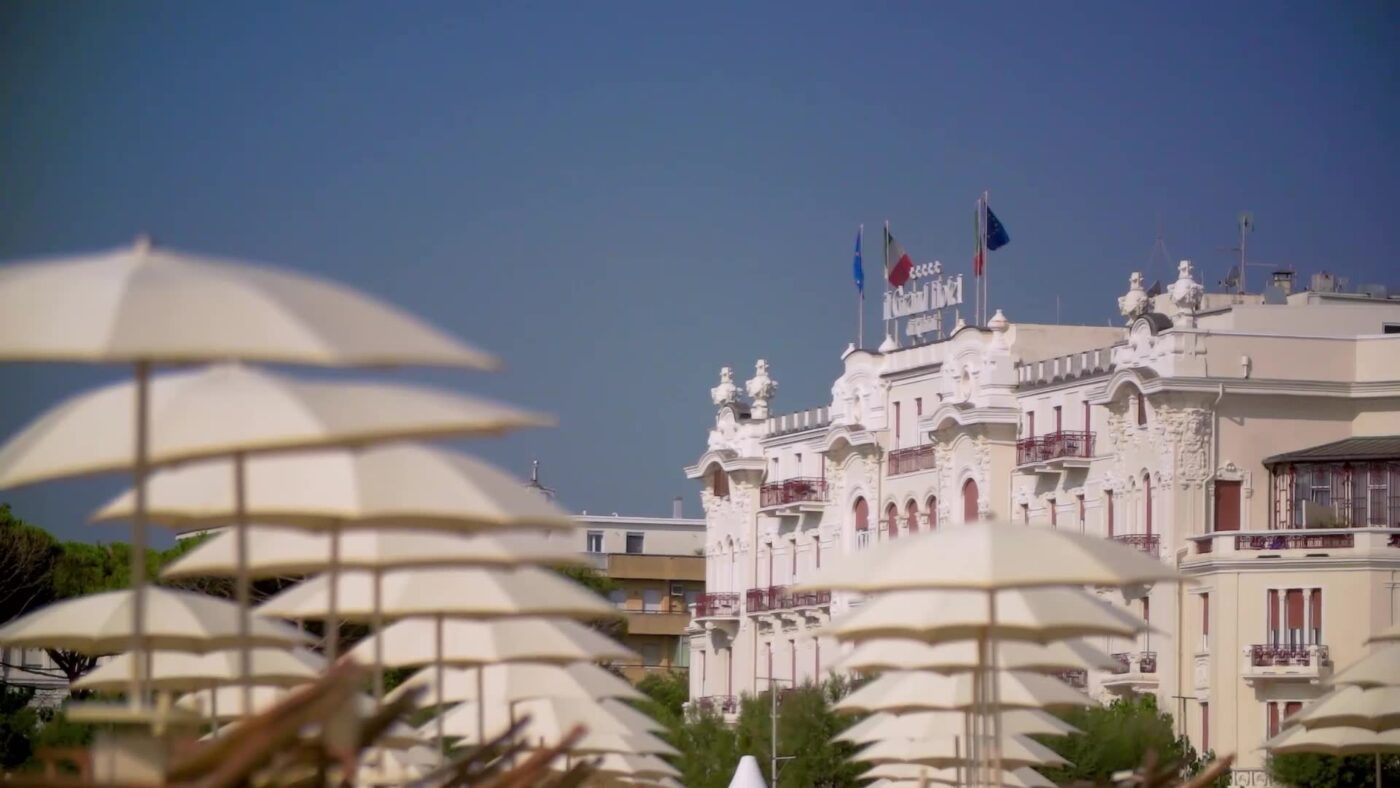 an exterior shot of the grand hotel of rimini