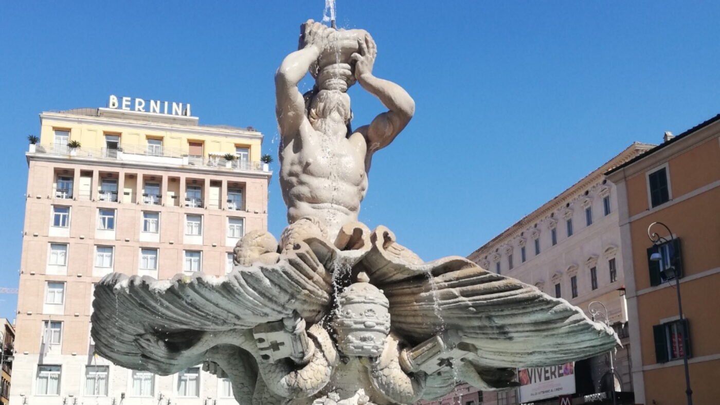 The Fontana del Tritone by Lorenzo Bernini; a man drinking out of a shell