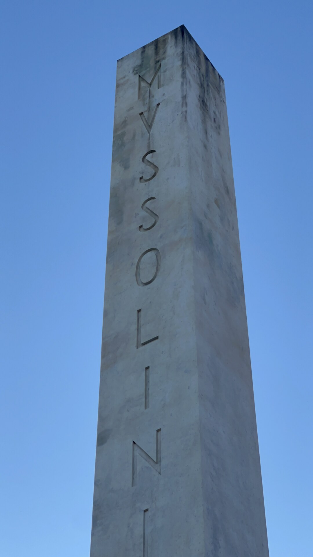 the Obeliscum in Rome with the name Mussolini carved into the side