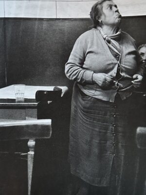 Black and white photography by Carlo Bavagnoli of an angry Italian nonna