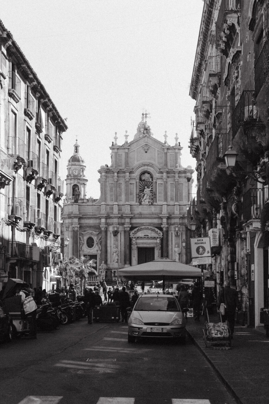 a black and white photo of a church in Catania