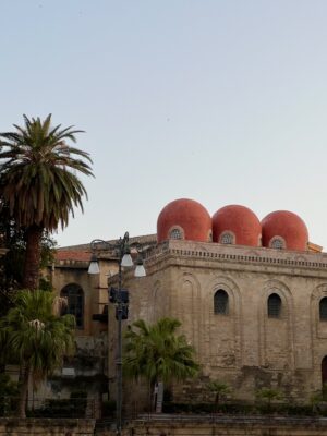 San Cataldo, Palermo church with three large red circles on the building and a palm tree on the side