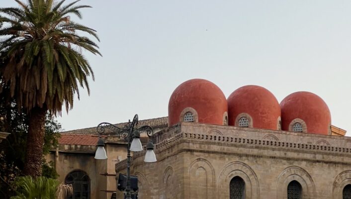 San Cataldo, Palermo church with three large red circles on the building and a palm tree on the side