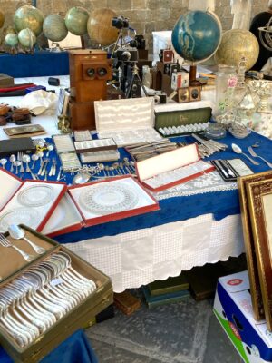 a table covered with various vintage items