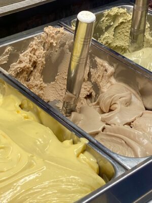 a close-up of two tubs of gelato