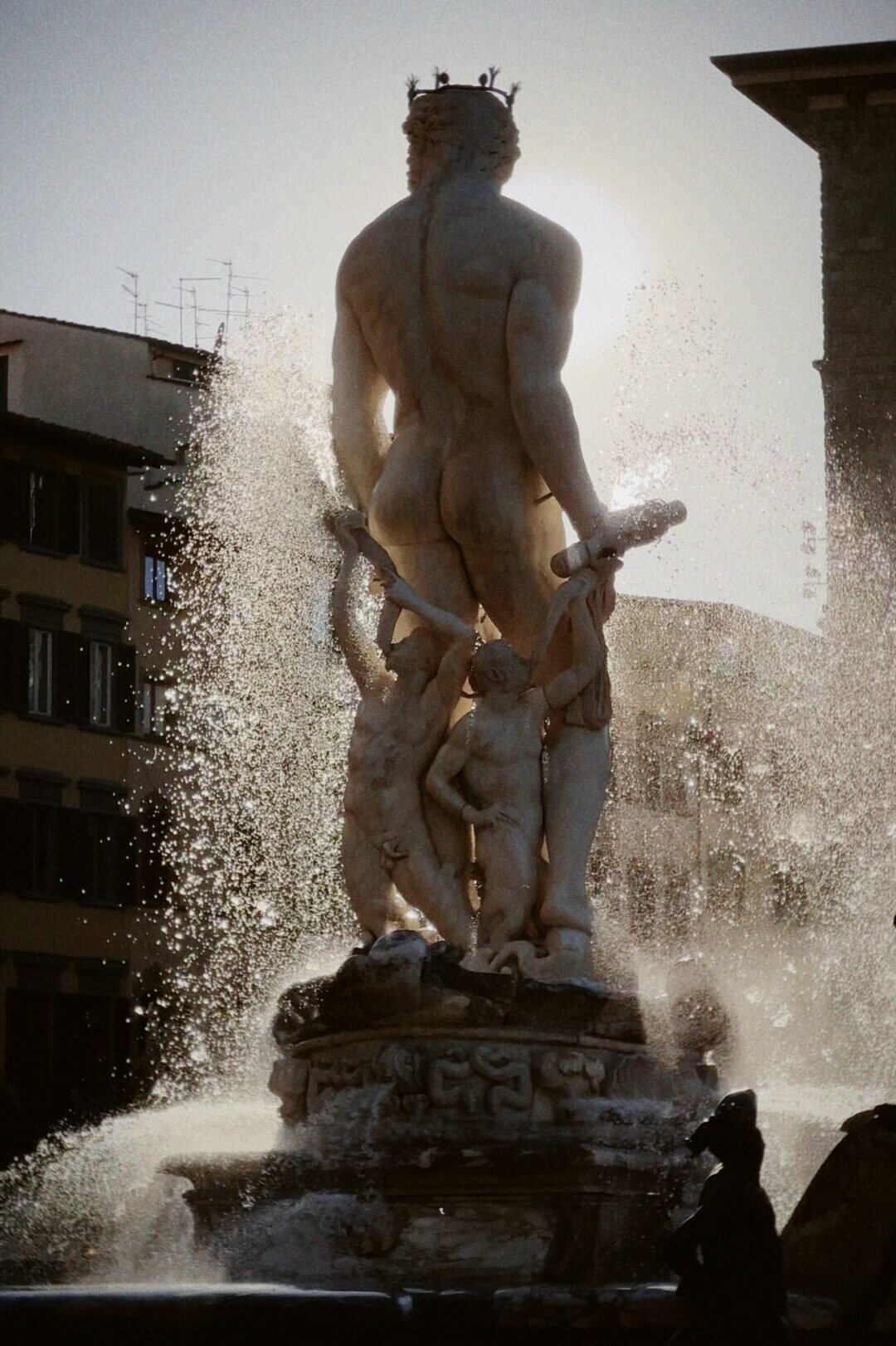tha back of the Poseidon statue in Piazza Della Signora in Florence
