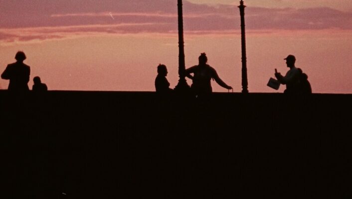 a bright pink sunset over the Arno in Florence
