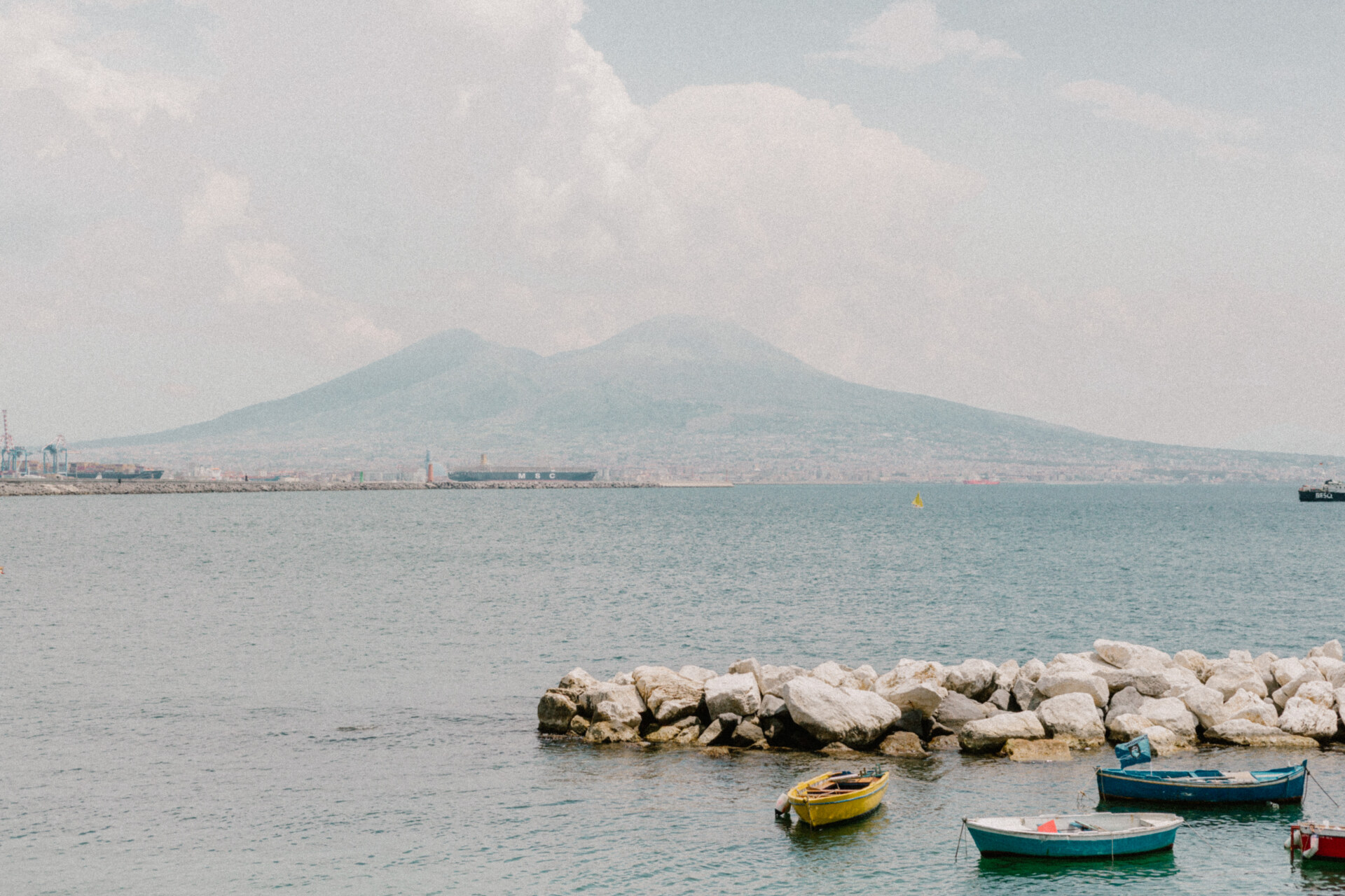 the sea in Naples with Vesuvius in the background