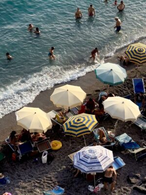 Minori - the beach filled with umbrellas and people