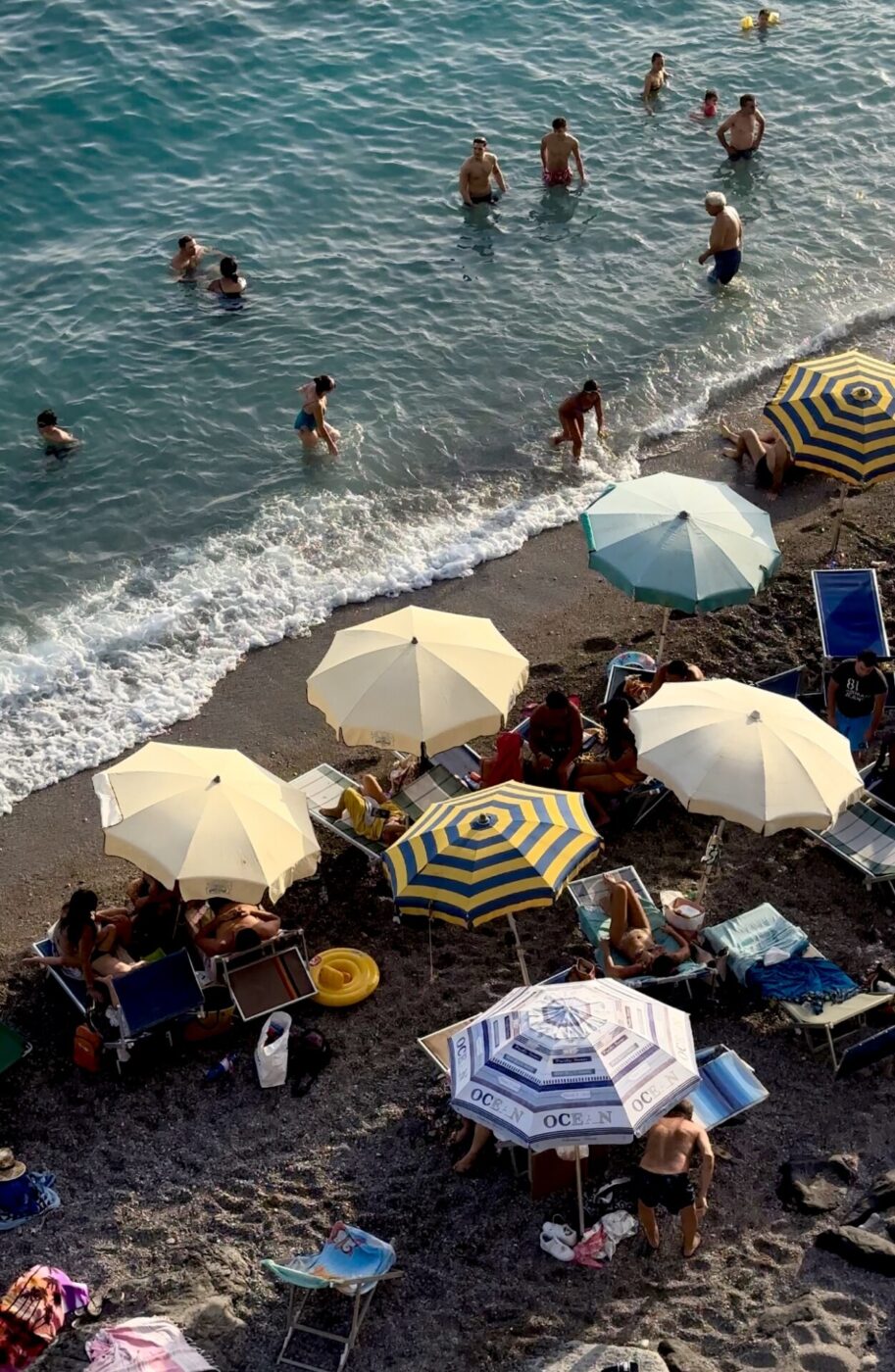 Minori - the beach filled with umbrellas and people