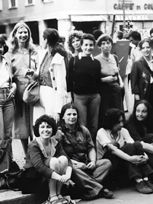 Courtesy of Libreria delle Donne di Milano - vintage black and white photo of a group of mostly smiling women