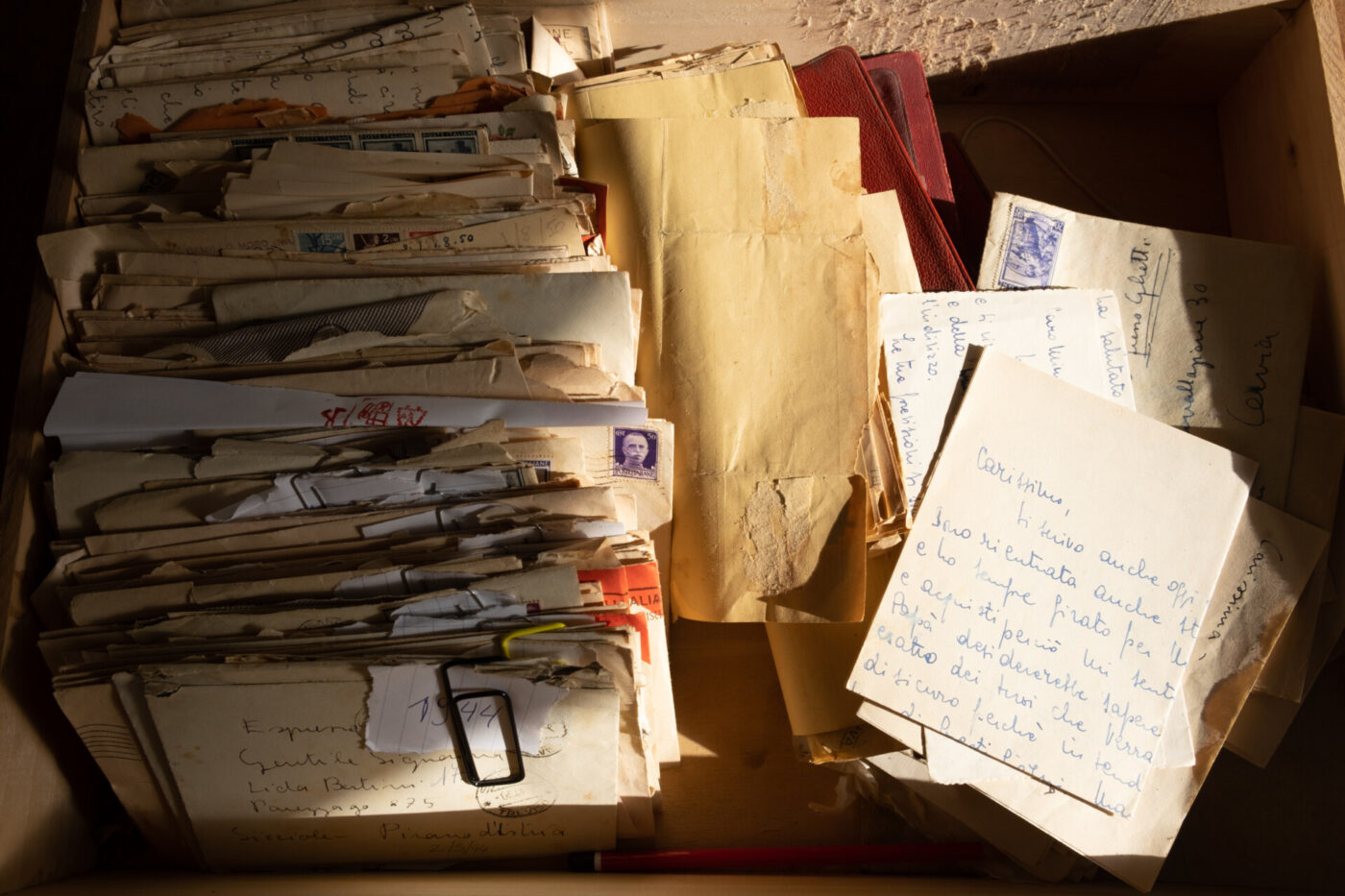 a box overflowing with love letters that were sent during world wars