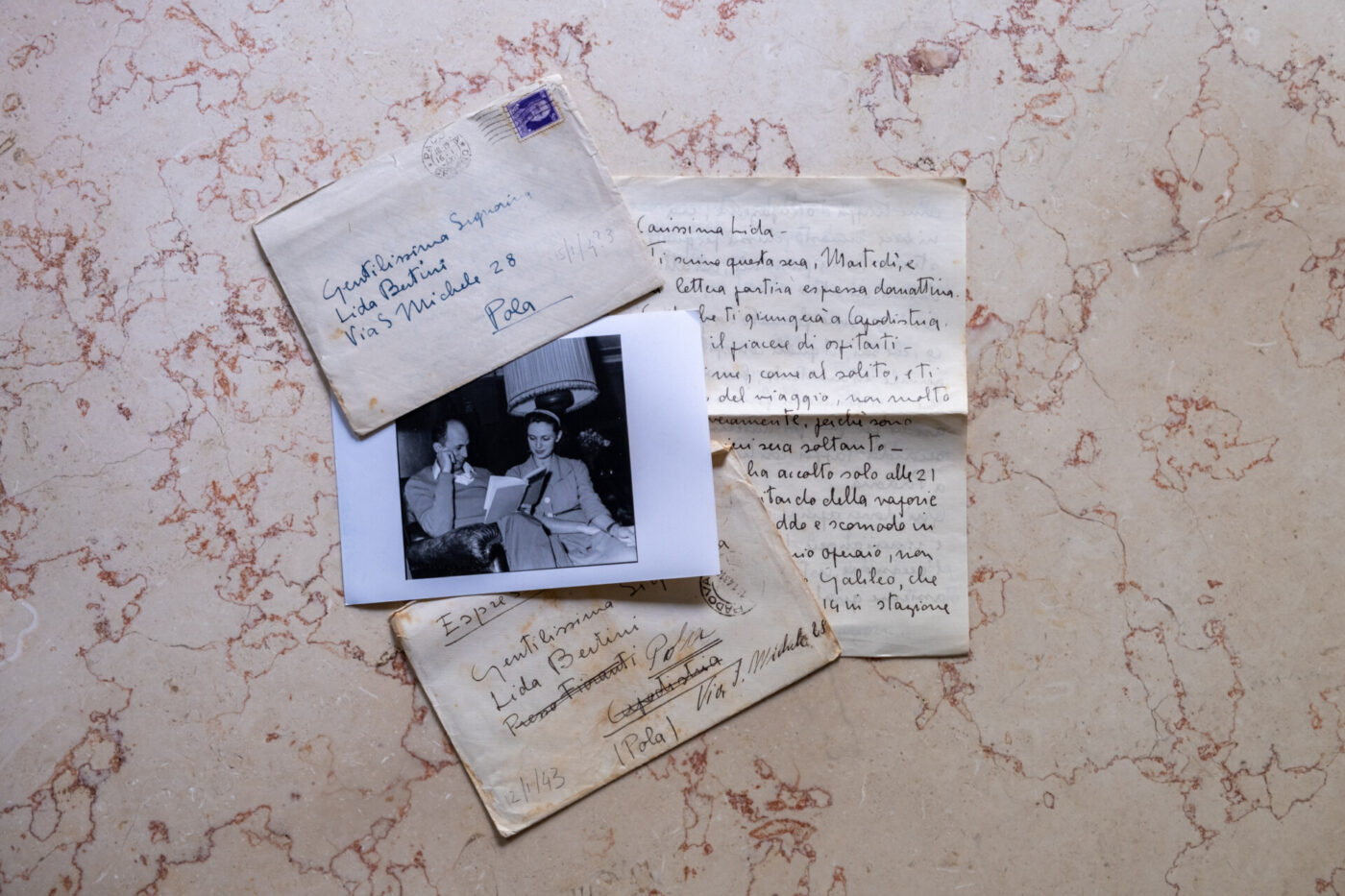 a collection of letters and photos sent between lovers during world war two