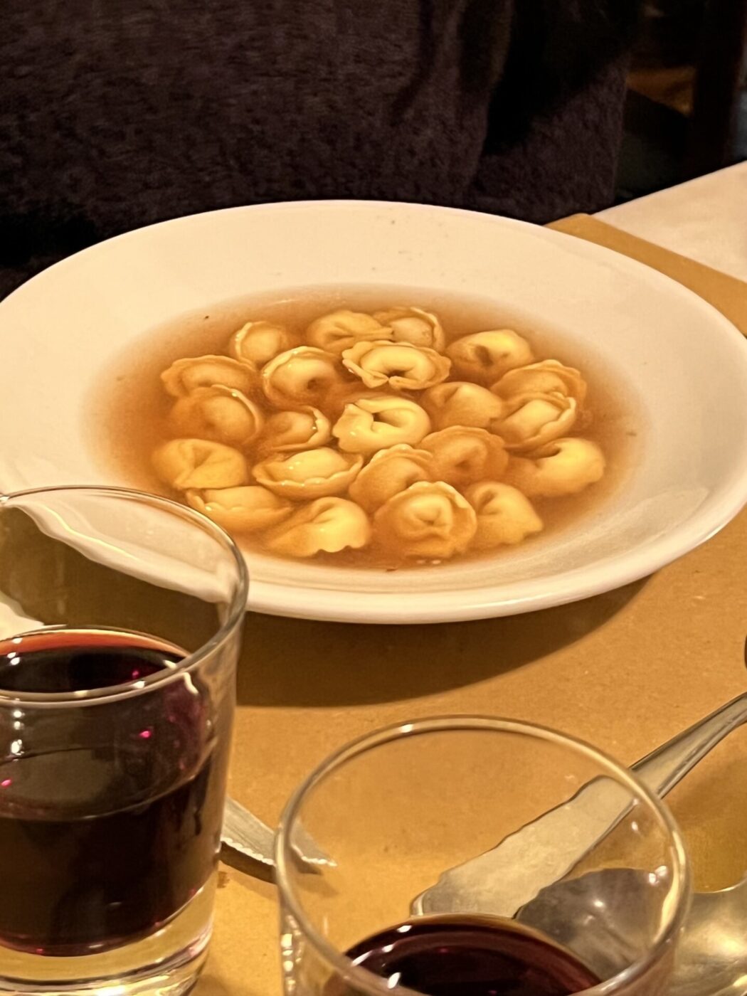 a bowl of tortellini in brodo