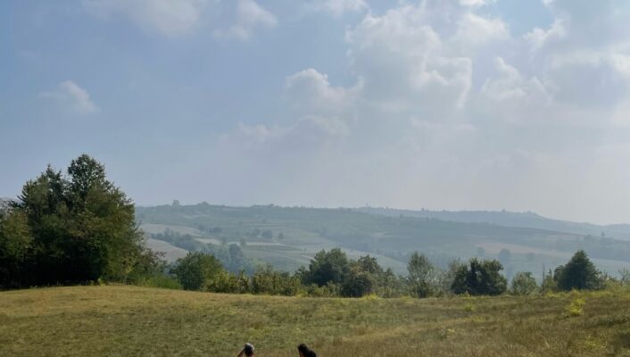 a few students walking through the hills at Casa Rotta