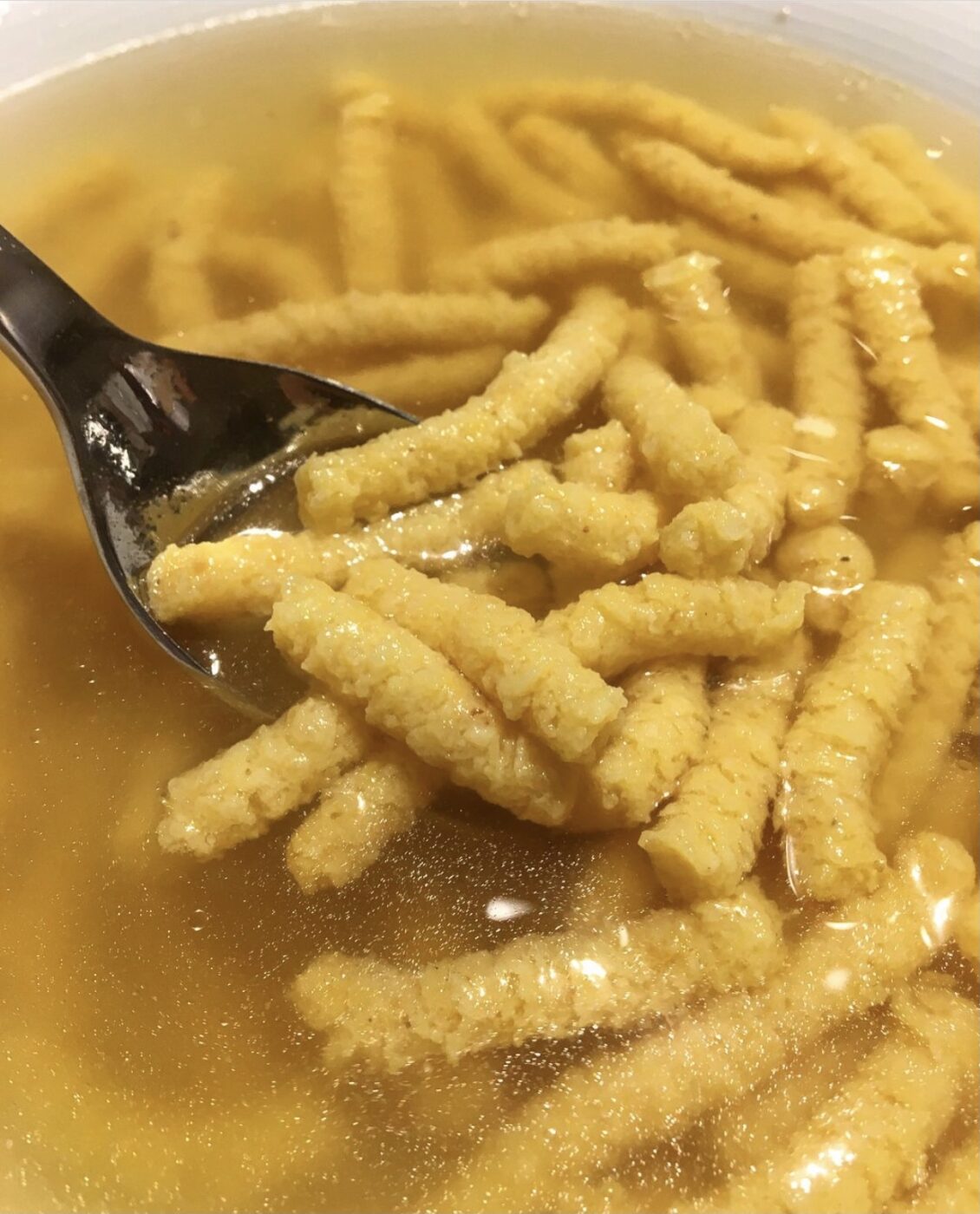 a bowl of passatelli in brodo