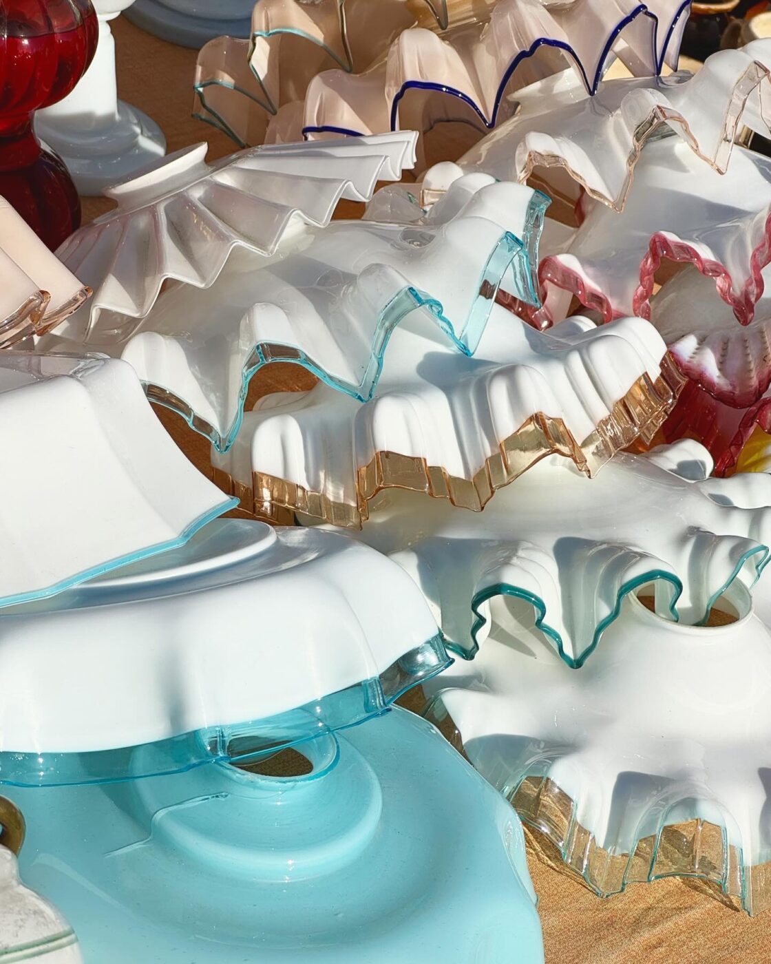 Paralume - glass lampshades for sale at a market in Puglia
