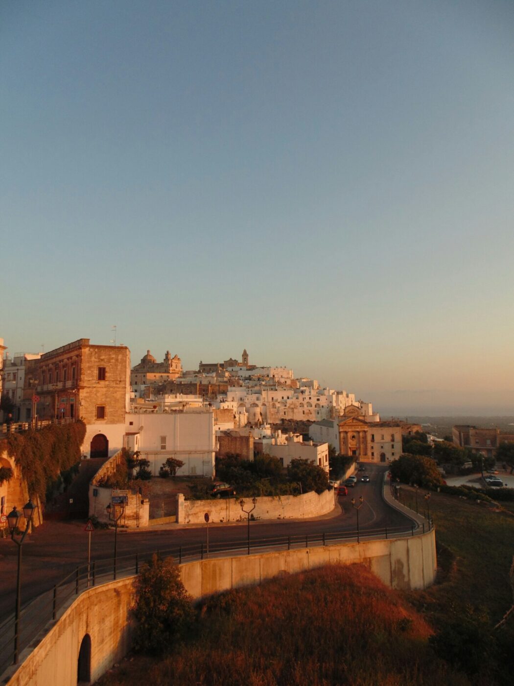 an image of the hilltop town of Ostuni Puglia at sunset
