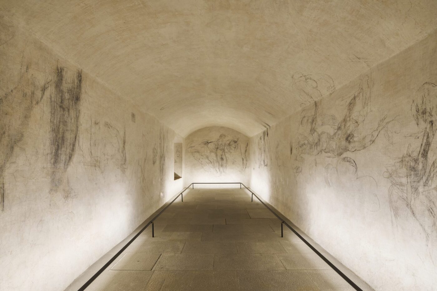an image of Michelangelo's secret room covered in charcoal drawings