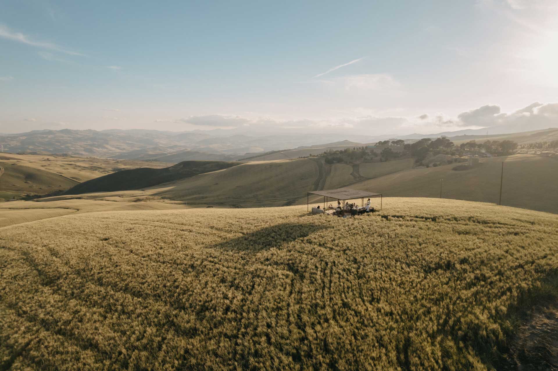 an image of the vast wheat fields of Sicily near Susafa at golden hour