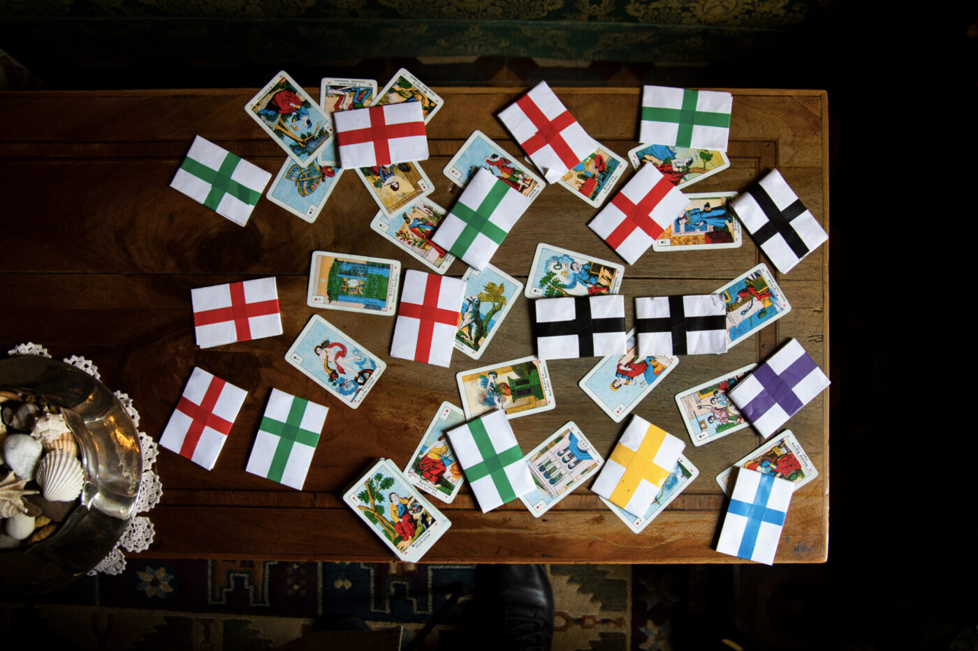 an overhead image of a table filled with tarot cards
