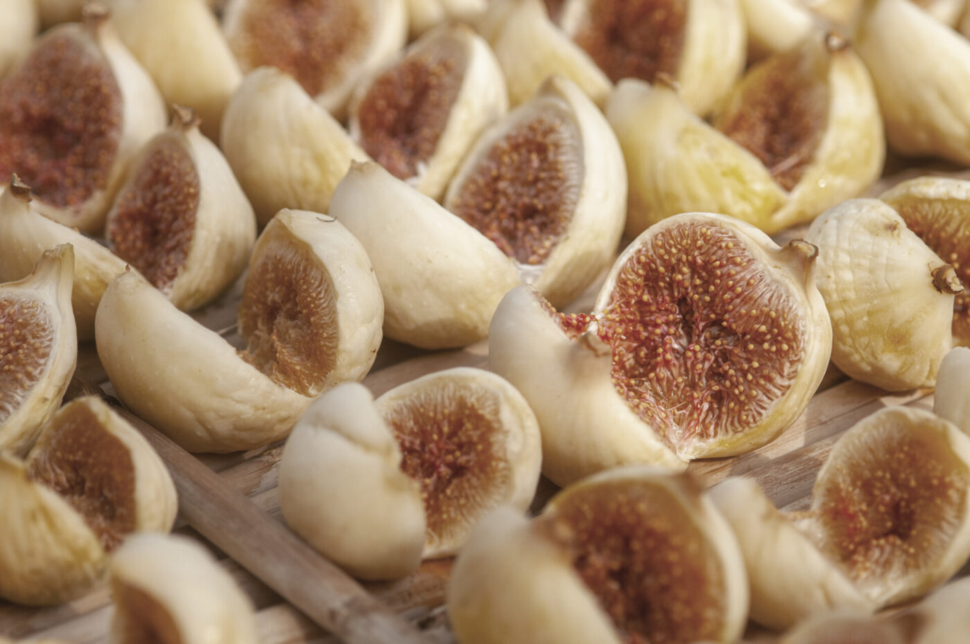close up of sliced drying figs