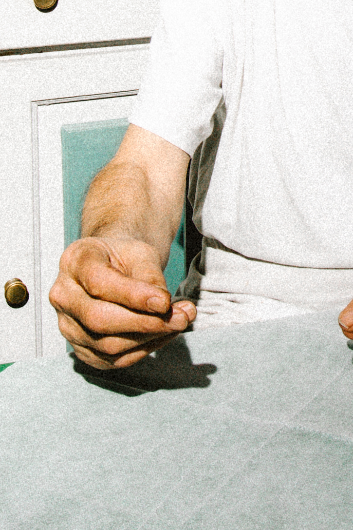 an image of a man doing the classic italian hand gesture