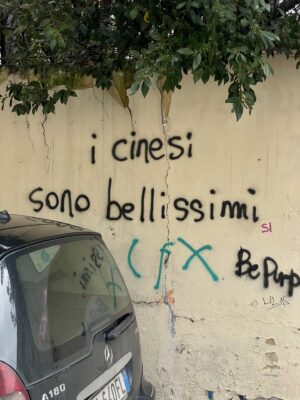 grafitti in prato reading "the chinese in prato are beautiful""